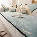 Copridivano in ciniglia azzurro con jacquard a foglie bianche e frange con pompon neri - 70x70cm / Verde Scuro
