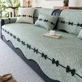 Copridivano in ciniglia verde chiaro con fiocchi neri e tessuto strutturato stile tweed - 70*70cm / Verde