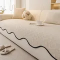 Copridivano in ciniglia crema con trama a nido d'ape e bordo a onde nero decorato - 90*70cm / Bianco