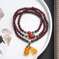 Triple-wrap garnet bead bracelet with double chalcedony gourds and vintage accents - Three Layers Garnet With Double Gourd Charm