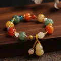 Natural gold silk jade pumpkin bead bracelet with a lucky gourd pendant for women - Pumpkin Bead Bell With Gourd