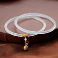 Elegantes brazaletes de ágata calcedonia natural con cascabel de oro y perla para mujer - Pareja de Bestia de la Suerte Calcedonia Blanca
