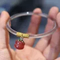 Delicate chalcedony agate bangle with gold wire wrap and red persimmon charm detail - Greyish Brown with Persimmon Charm