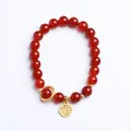 Natural 8mm red agate bead bracelet with golden Fu pendant charm on a white background - Red Agate Ring Fu Charm Style / 8mm / Red