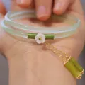Celadon chalcedony bangle with a white flower charm and green bamboo tassels - Apple Green Five-Petal Flower Bamboo Single