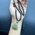 Natural light green jade Buddha pendant with hand-carved details on black beaded necklace - Matte Black Agate Agarwood Turquoise Hetian Jade Buddha Necklace