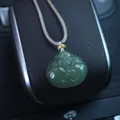 Green Hetian jade Laughing Buddha pendant with hand-woven cord and golden bead detail - Hetian Jade Hug Buddha Saucer Spacer Braided Necklace