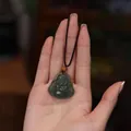 Deep green nephrite jade Buddha pendant necklace with a black woven cord and wood bead - Hetian Jade Buddha Braided Cord Necklace