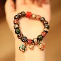 Ethnic beaded bracelet with cloisonne charms and a small golden bell for women - Multicolor Glaze Family Mythical Beast