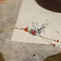 Elegant jade chalcedony and agate mobile phone strap with gold cord and white pearls - Apricot Pearl Red Agate Ping An Kou