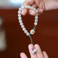Natural Hetian jade beaded bracelet with lotus charm and green handmade woven rope - White Jade Plum Blossom Blue Cord Woven
