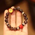 Ethnic style glass bead bracelet with dark brown sand texture and red religious charms - White And Yellow Glaze