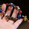 Colorful glass bead bracelet with gold foil texture and golden vajra scepter charm - Multicolor Glaze Vajra Pestle Style