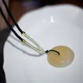 Elegant pale yellow chalcedony Pi Yao pendant with black braided cord and gold beads - Black Large Chalcedony Peace Buckle Lock Necklace