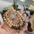 Dual-strand sandalwood and green jade bead bracelet with decorative ring pendant - Milk Fragrance Wood Jade Style