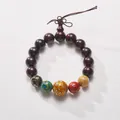 Macro view of sandalwood beads with five elements colorful lacquer art pendants - Buddha Head Five Elements Lacquer Style Sandalwood