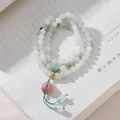 Three-wrap natural stone bracelet with green turquoise beads and pink jade pendant - Tianshan Jade Yanyuan Peace Buckle Tassel