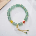 Green aventurine bamboo bead bracelet with red agate, white gourd pendant and gold tassels - Green Aventurine Bamboo Agate Mix