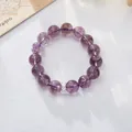 Macro shot of natural purple amethyst beads with an elegant silver crystal spacer bead - 12mm Lavender Jade Square Zirconia