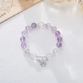 Elegant natural amethyst beaded bracelet featuring silver butterfly charm on white texture - 10mm Amethyst White Crystal Butterfly Bracelet
