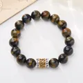 Natural tiger eye stone bracelet with silver engraved mantra bead on vintage background - Six-Word Mantra Style 1 (Yellow Blue Tiger Eye)