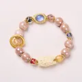 Rosa Porzellan-Fuchs-Perlenarmband mit Blattgold-Akzenten und lila Katzenaugen-Perle - Pink-Violett Keramik Goldfolien-Glasur Stil