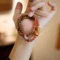Bracelet double rang en jade naturel avec perles en bois et pendentif divinité - Agate Rouge du Sud (Kuk Bodhi)