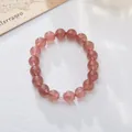 Macro detail of natural pink strawberry crystal beads with a sparkling silver accent - Large Bead Strawberry Crystal Zirconia Style