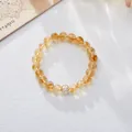 Detailed close-up of yellow citrine beaded bracelet with square crystal centerpiece - 8mm Yellow Azozeo White Square Zirconia