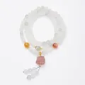 Multi-layer natural fluorite bead bracelet with pink crystal carved lion pendant - Tianshan Green Fluorite Lion Style