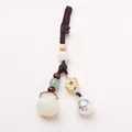Handmade Bodhi seed money bag keychain with gourd charm and vintage flower bell pendant - Bodhi Money Bag Bell Flower Keychain
