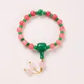 Pink crystal beads bracelet with green spacer beads and flower pendant charm - Rhodochrosite Style