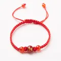 Red braided rope bracelet with natural carnelian beads and golden ox zodiac pattern - Zodiac Ox