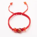 Adjustable red rope bracelet with natural red agate bead featuring a golden snake zodiac - Zodiac Snake