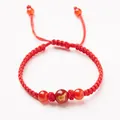 Red braided rope bracelet with three carnelian beads and golden Zodiac Pig pattern - Zodiac Pig