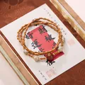 Zen style bamboo-shaped beaded bracelet with red cinnabar bead and Bodhi seeds - Olive Core Bone and Red Agate Bracelet