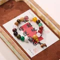 Multicolor Buddhist 18-bead prayer bracelet with tassel on decorative Chinese card - Fourth Gen 18 Seeds (Plain)