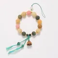 Handcrafted multi-color Buddhist bead bracelet with carved seeds and lotus pendant - Gradient Bodhi Lotus Bracelet