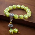 Ethno-Armband mit grünen Porzellanperlen und silbernem Gebetsmühlen-Anhänger - Grünes Mantra-Perlen