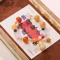 Multi-bead bracelet with crystal, agate and jade gourd pendant on a gift card - Pumpkin Bead Bamboo Gourd Bracelet