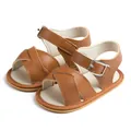 Classic brown faux leather baby sandals with soft rubber sole and crisscross straps - 12cm (6-12 Months) / Brown