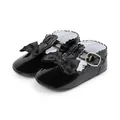Shiny black patent leather baby Mary Janes with satin bow and wavy trim detail - 12cm / Black