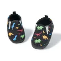 Scarpe primi passi in tela nera per neonati con stampe di dinosauri colorati - Taglie forti / Nero