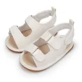 Close-up of cream PU leather baby sandals with textured finish and velcro straps - 13cm (12-18 Months) / White