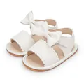 White baby girl sandals with large bow accent and wavy edge detail in textured faux leather - 11cm (0-6 Months) / White