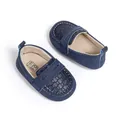Macro detail of navy baby loafers showing white stitching and 0-6 months size marking - 12-18M / Blue