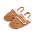 Brown infant slippers with white sherpa lining and adjustable velcro strap for winter warmth - 12cm (6-12 Months) / Brown