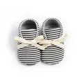 Infant striped slip-on baby shoes in dark green and white with soft ribbon bow detail - 11cm / Striped Green