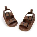 Detailed top view of brown baby sandals with rubber soles and double buckle fasteners - 11cm / Dark Brown / 0-6 Months
