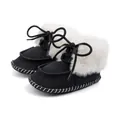 Detail view showing the design and texture of black suede baby boots with white faux fur lining. - 12cm / Black